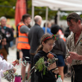 Ranger with a child at Carols in Harmony Square