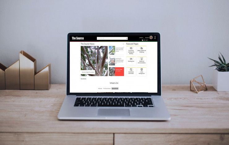 The Source homepage on Laptop