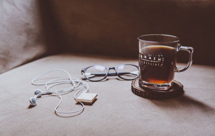 coffee, glasses and headphones