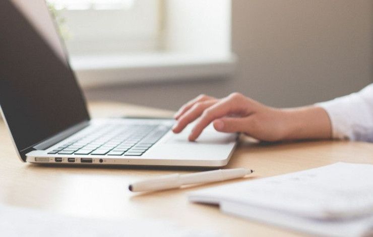 computer with person typing