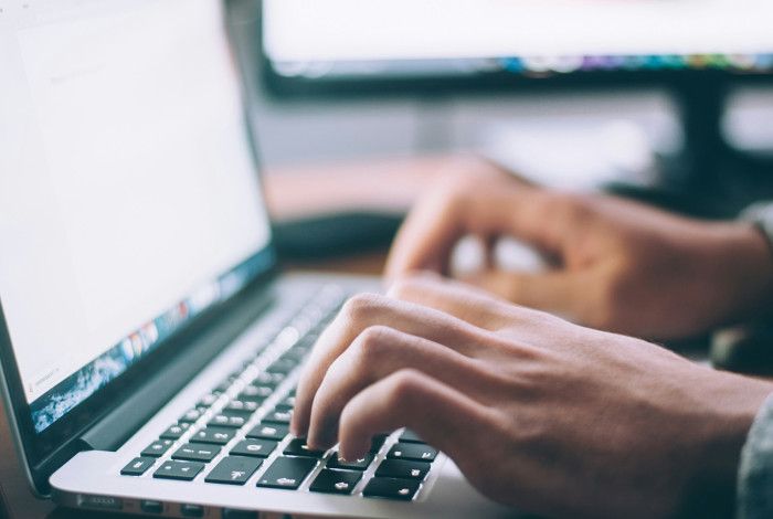 Person working on a laptop