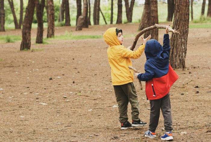Two children playing outside