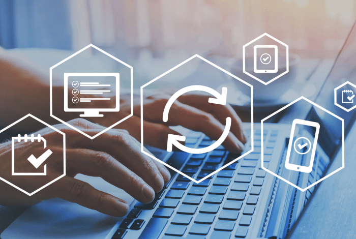 Person typing on a keyboard