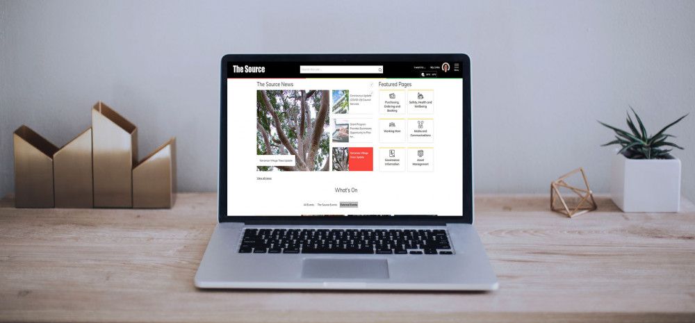 The Source homepage on Laptop