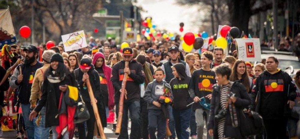 people holding large speech bubbles