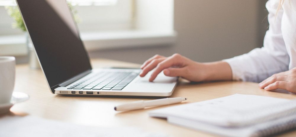 computer with person typing