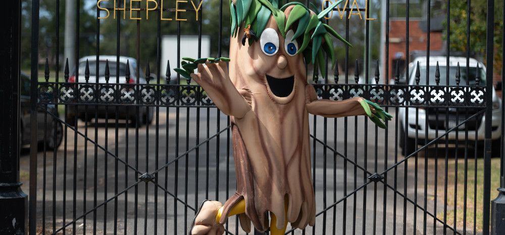 A person in a tree costume