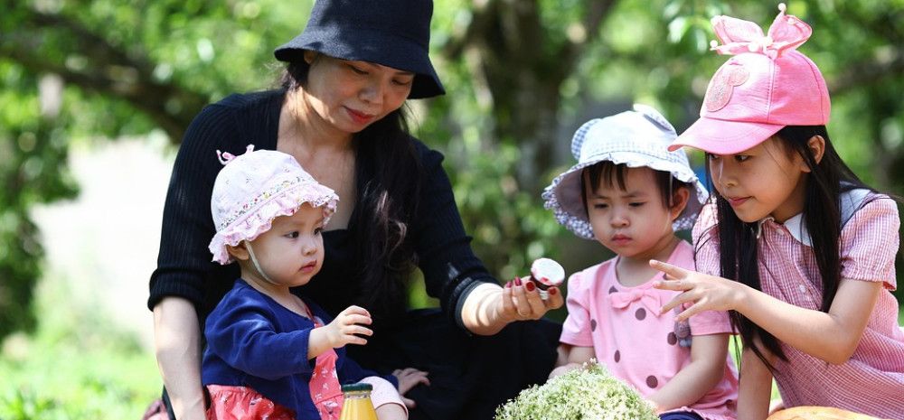 A mother with three children