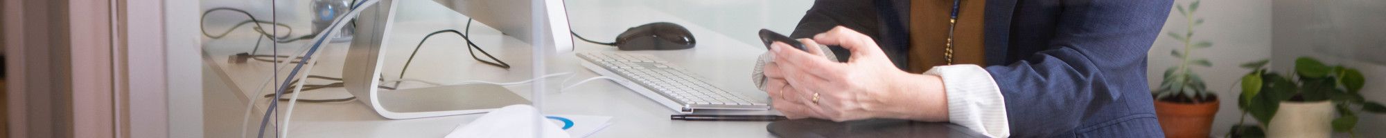 employee at standing desk