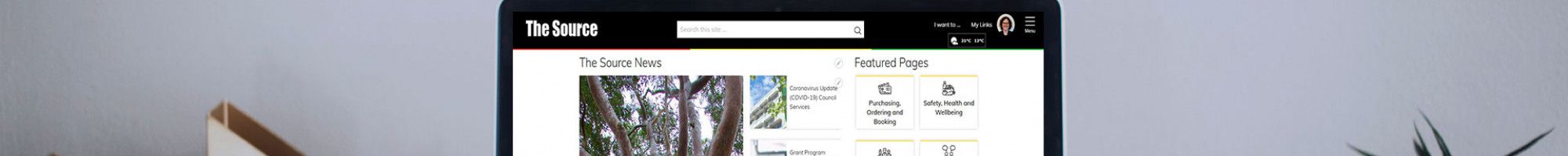 The Source homepage on Laptop