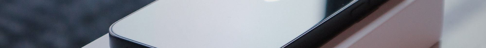 Iphone and box on table