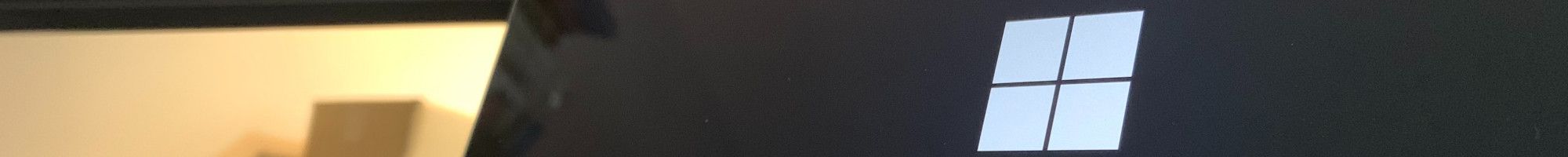 laptop with windows update screen showing