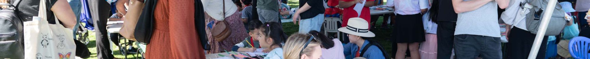 a tent full of people at a festival 