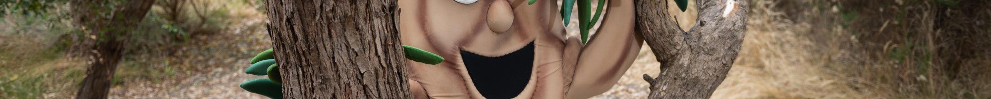 Harry habit hiding behind a tree