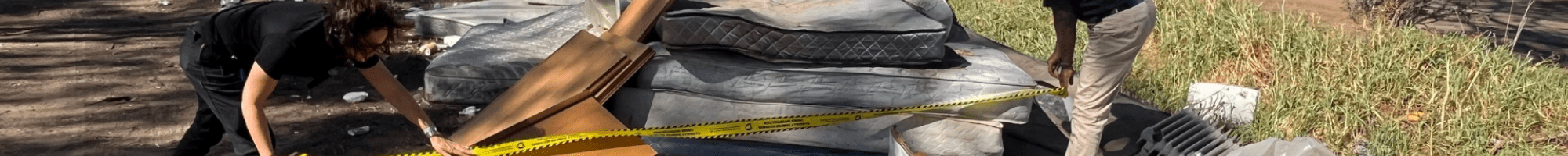 Sanjay and Caroline with dumped waste