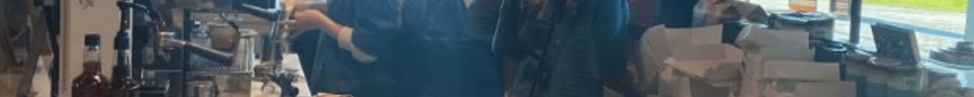 Staff serving at new cafe Lucky Lulu at Springvale Library