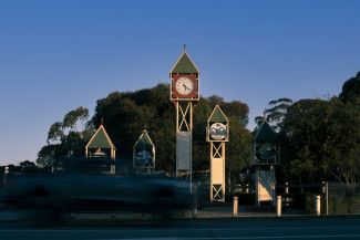 Mary Orsino -  movement is of the town clock which I thought could be considered as movement, and I used a slow shutter speed to capture the traffic movement.