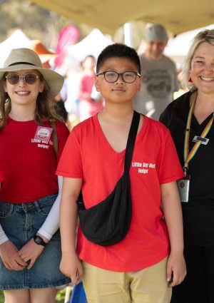 a tent full of people at a festival 